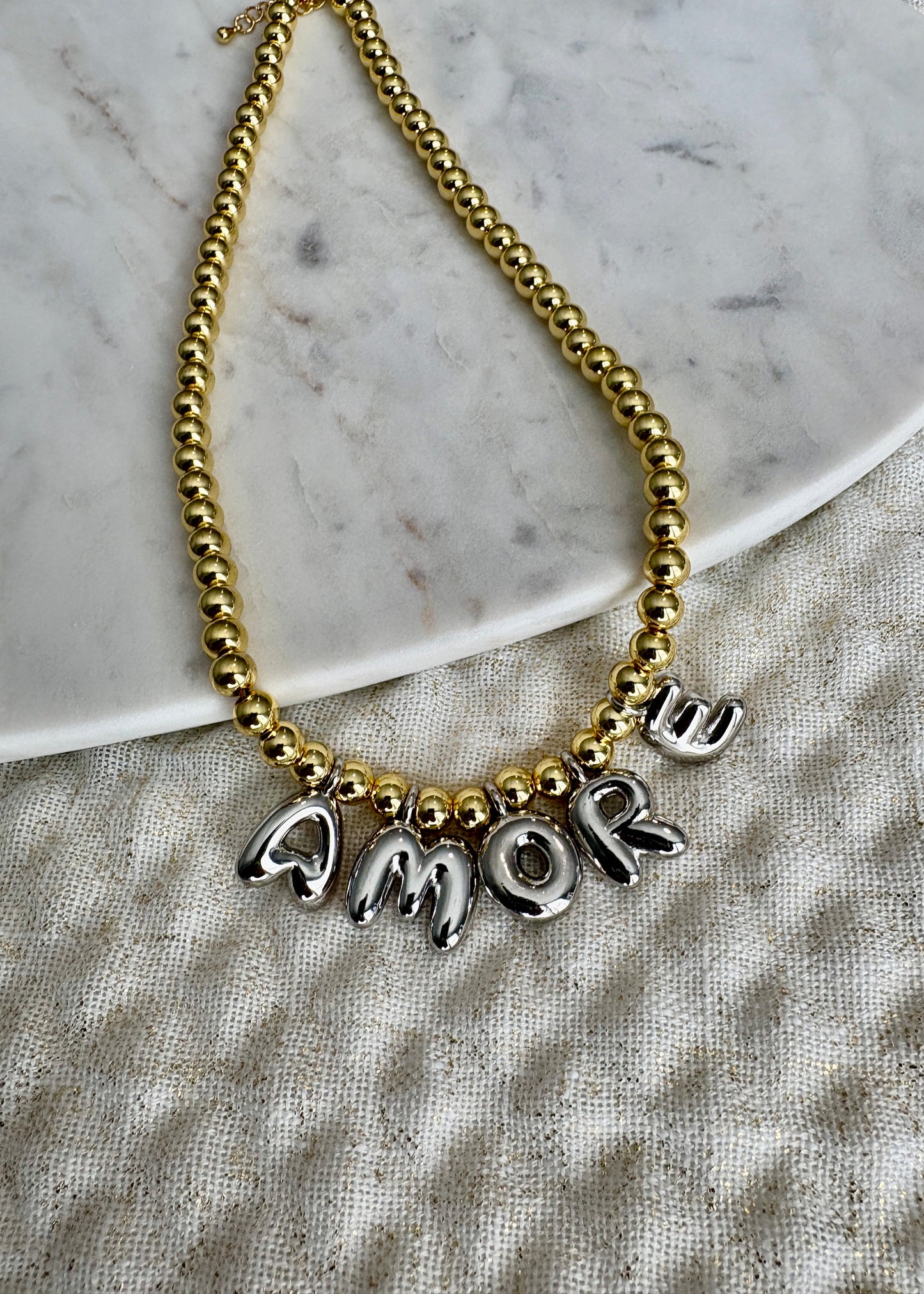 Amore Necklaces